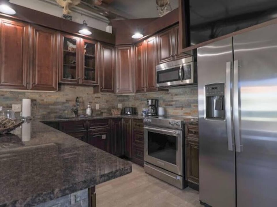 The kitchen has all the amenities you would need. 