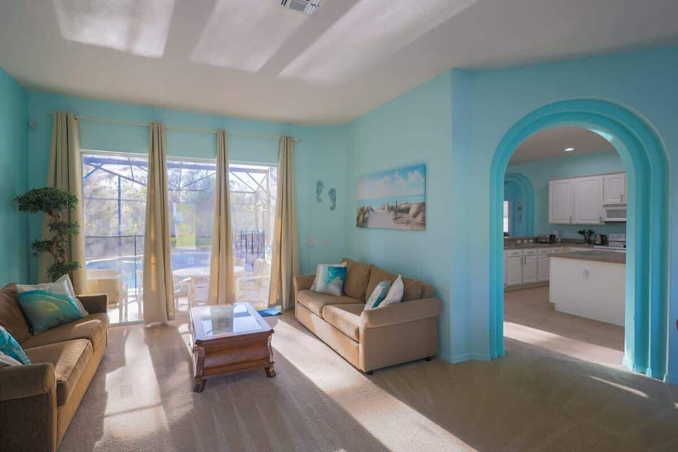 Living room area with great view of the pool.