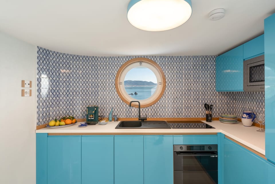 Fully equipped kitchen with utensils and appliances