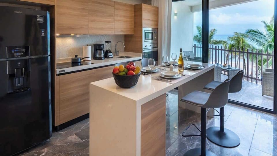 Fully equipped kitchen with ocean views — cooking has never been this good.