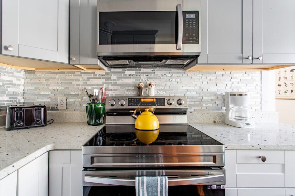Kitchen includes an electric stove