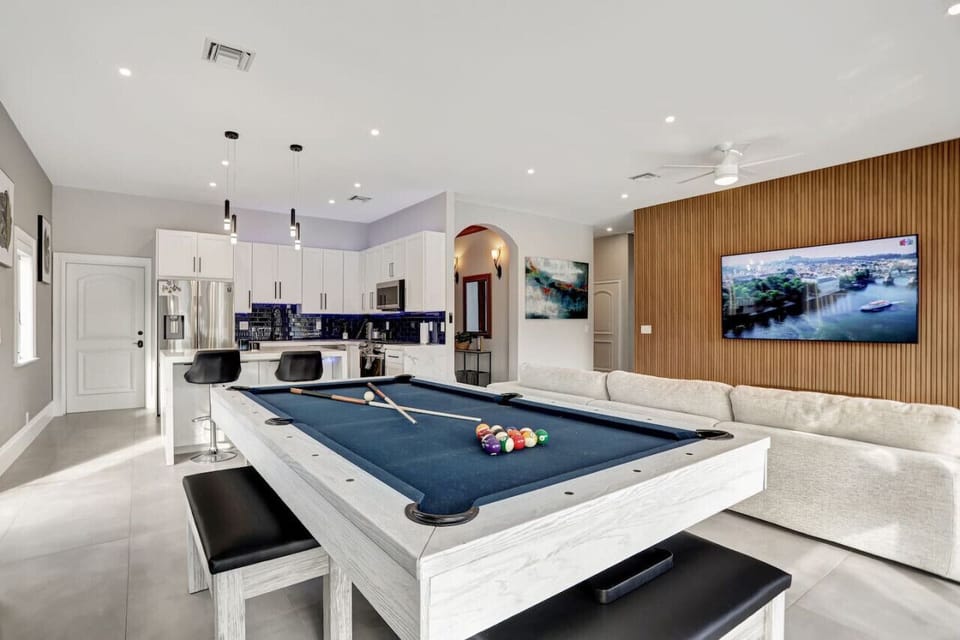 A convertible pool-dining table: From pool sharks to dinner parties, this table is always ready.
