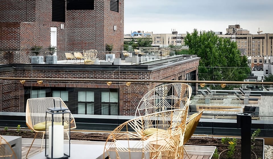 Sip cocktails on the rooftop with breezy lounge seating.