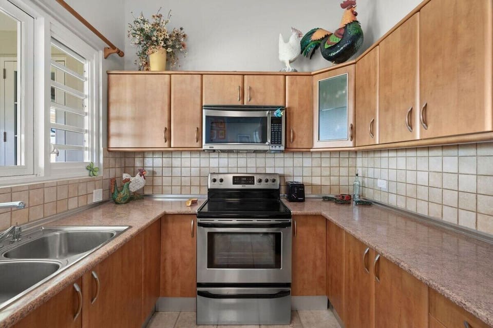 The fully equipped kitchen is perfect for an extended stay.