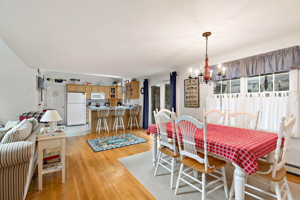 Living, dining, and kitchen spaces flow together seamlessly 