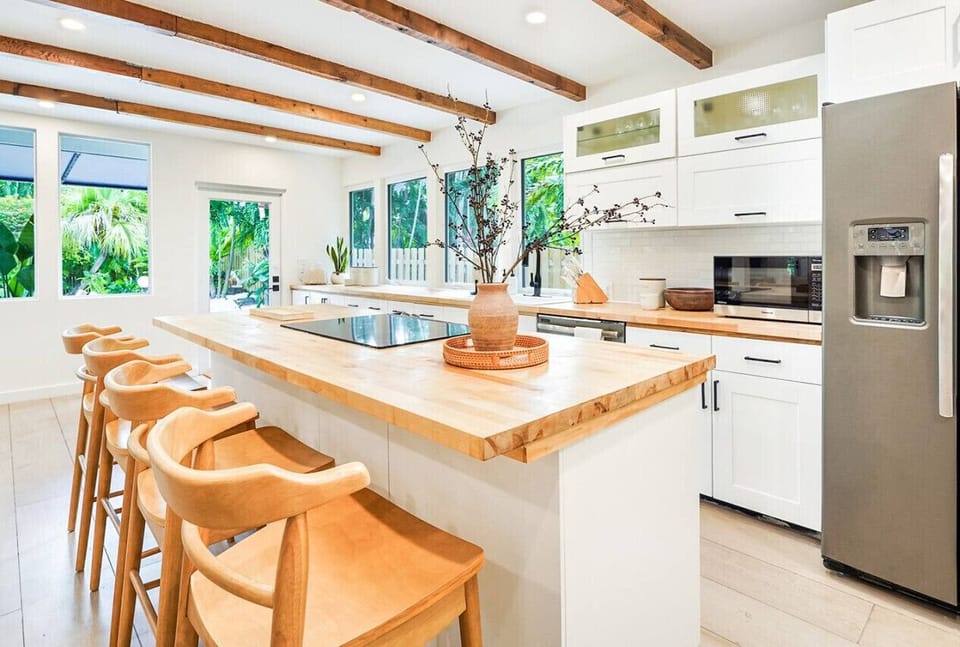 Spacious, stocked kitchen with complete set of cookware.