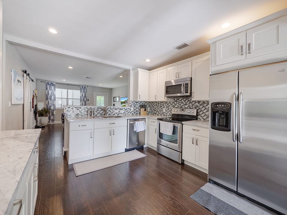 Spacious kitchen stocked with everything you need to cook meals at the home. 