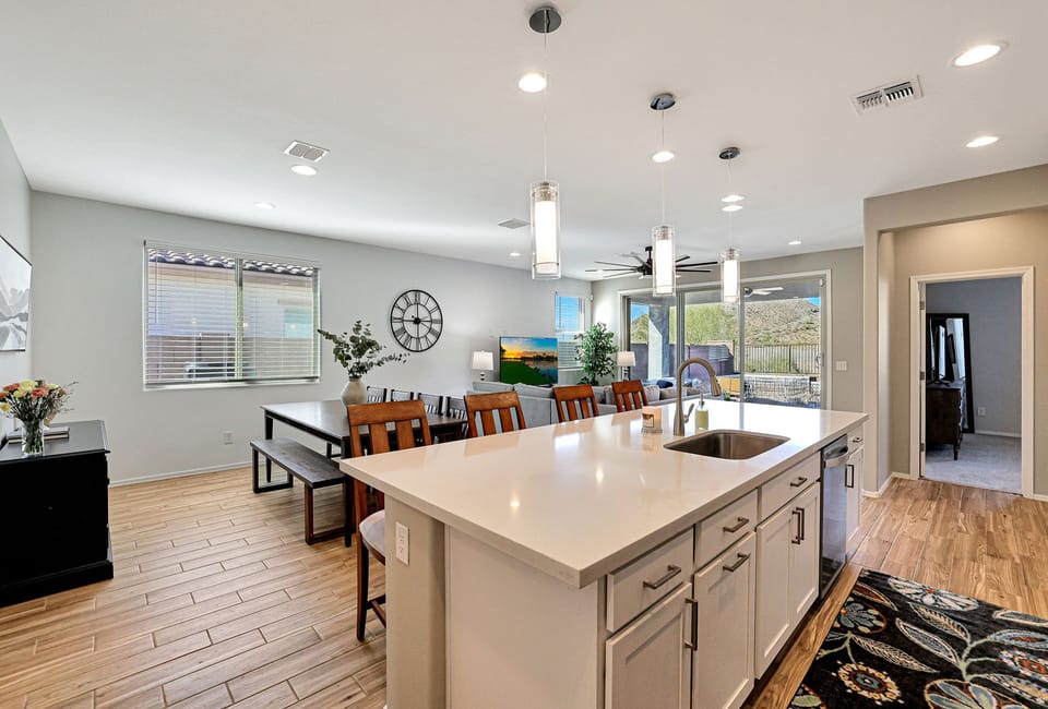 View of Kitchen, Dining Area and Living room.