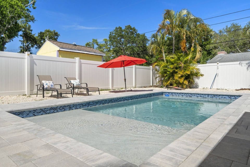 Sparkling In-Ground Heated Pool in the Privacy of the Fenced in Backyard