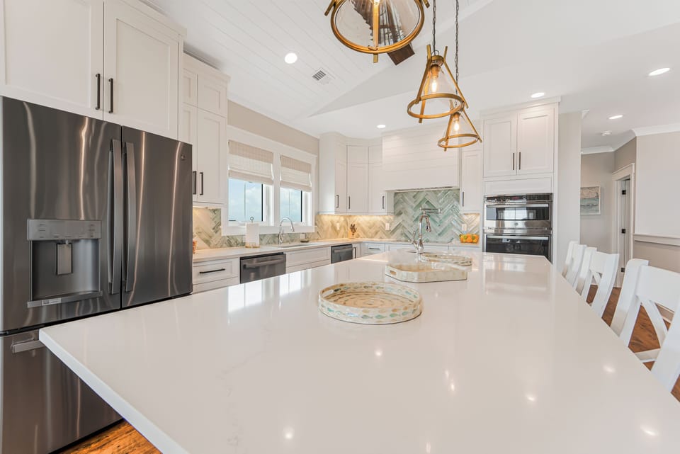Kitchen with 9'x4' island, 5 burner cooktop, 2 refrigerators, 2 dishwashers.
