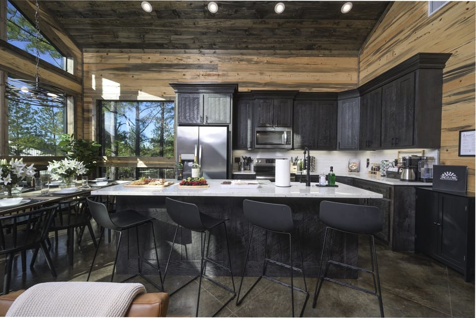 Come appreciate the craftsman beauty of our well-appointed and fully stocked kitchen