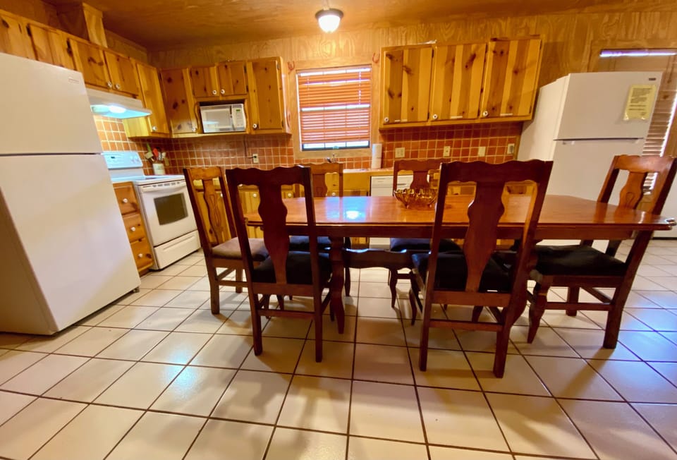 Villa Muniz - Large kitchen, well stocked, with 2 refrigerators, 2 dining tables and cedar cabinets.