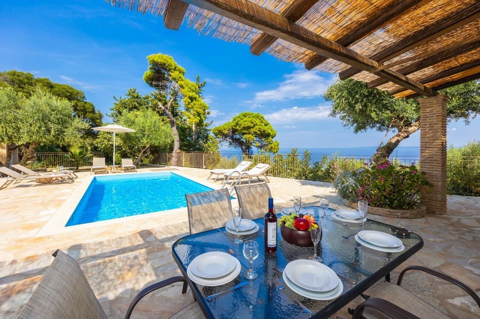 Private pool and terrace with panoramic sea views