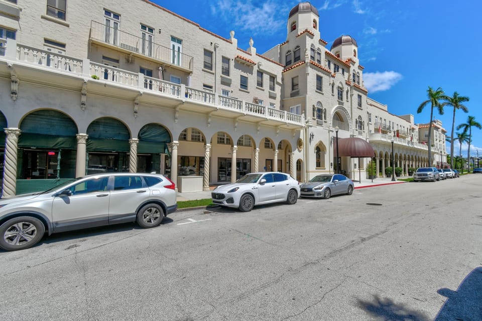 The Palm Beach Hotel is a true Historic Landmark showcasing stunning double bell tower Spanish Baroque architecture that exudes old-world glamour and the charm of a bygone era. Fun fact: Publix is conveniently located just across the street.