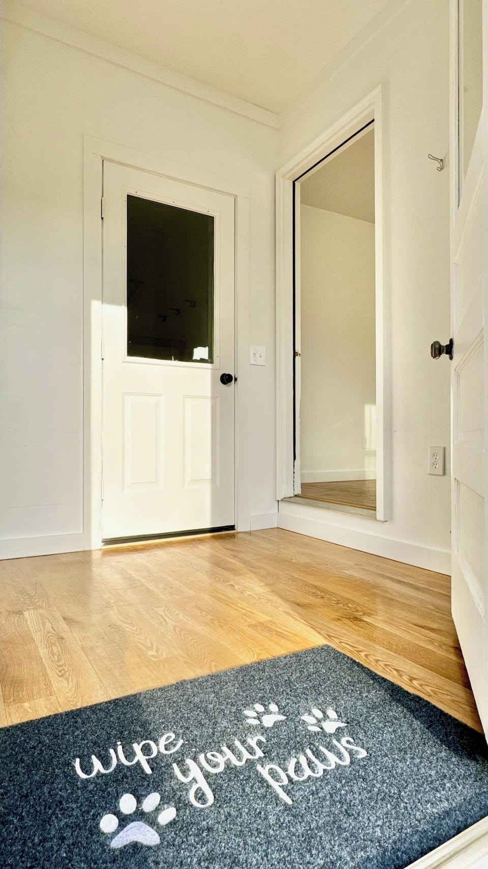 Mudroom leads to garage and laundry room