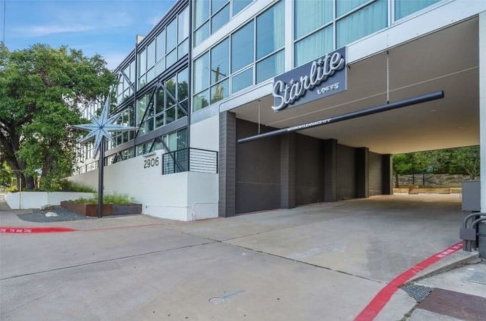 Front of condo building w/ cute retro styled vibes. Bus stop located steps away.