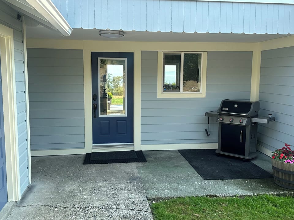 Covered front entry with Weber BBQ