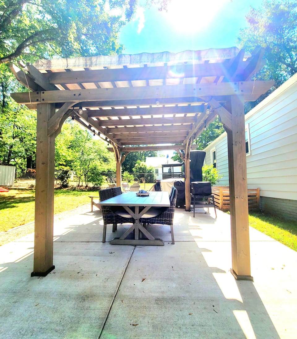 Elevate your backyard experience - grill, make pizza, and eat outdoors! 