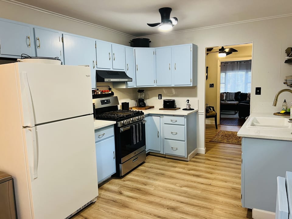 Full refrigerator, microwave, blender, toaster & crockpot round out your kitchen