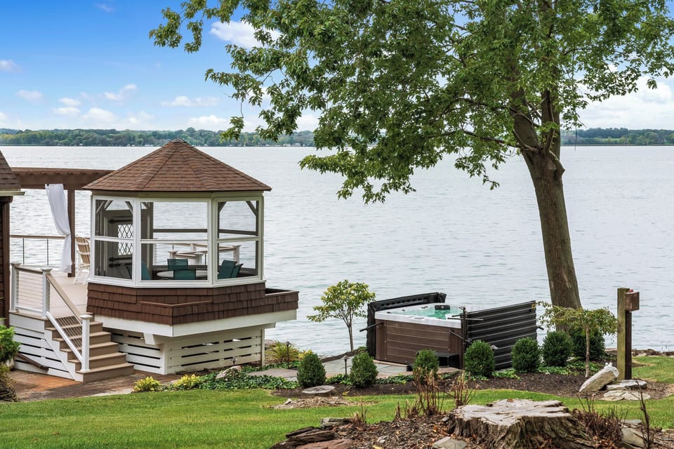 Relax in the hot tub overlooking the lake after a day of exploring the Finger Lakes wine region.