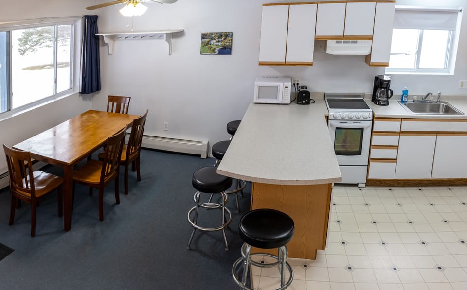 Prepare meals or quick snacks in the open-concept living space.