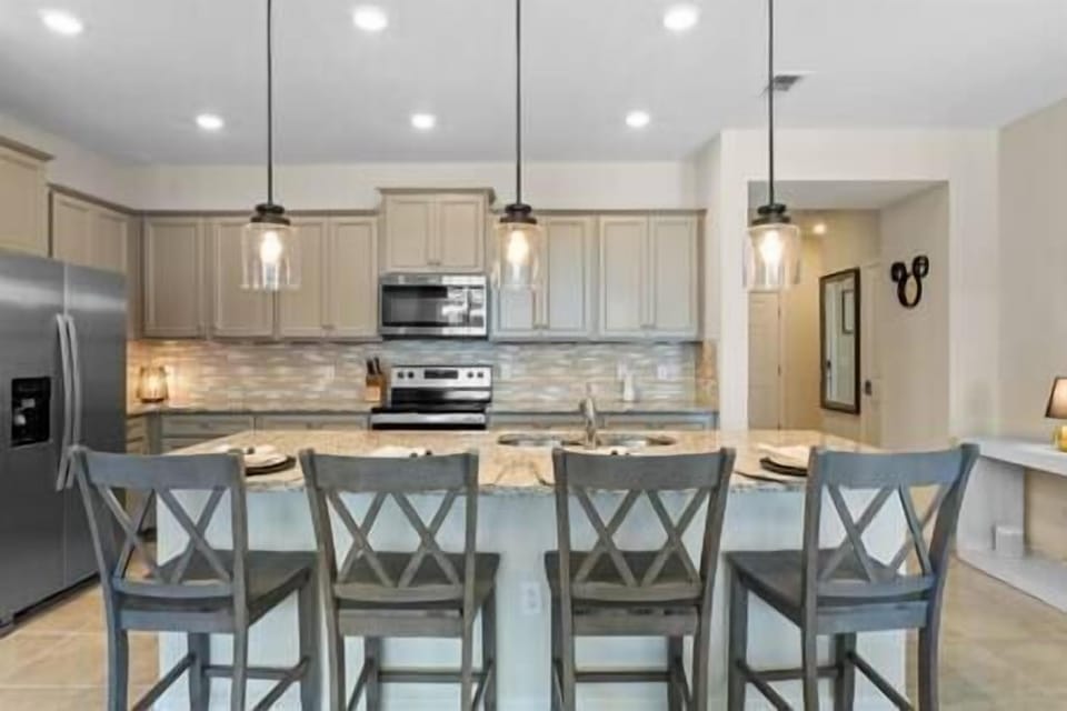 Fully Outfitted Kitchen with Island Seating for Four
