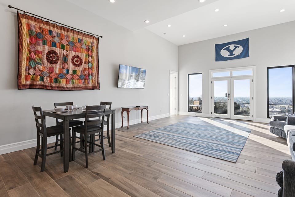 Dining area can be expanded with extra tables and chairs in laundry room
