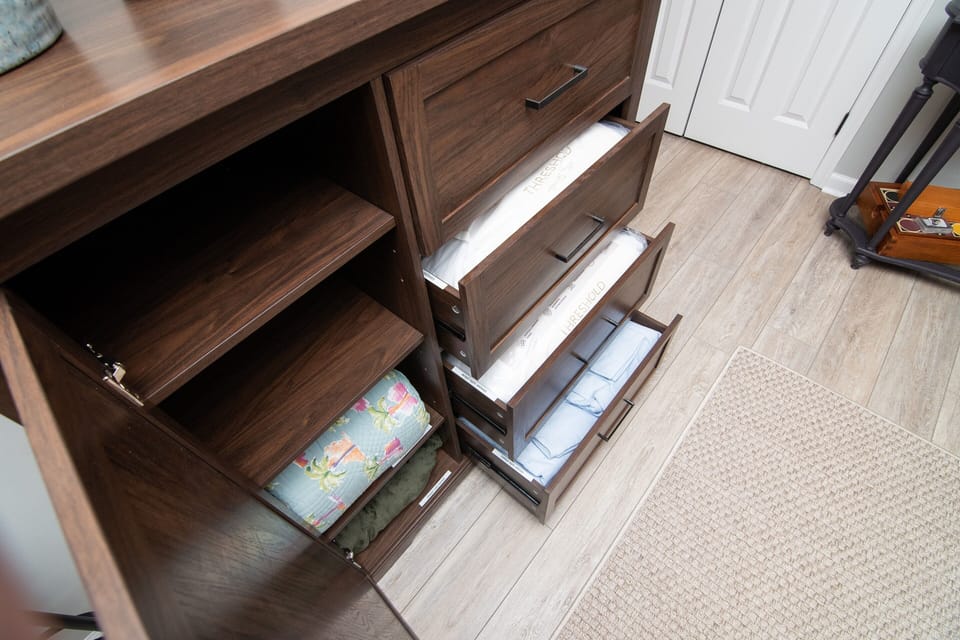 This armoire has all you need to create a cozy bed with the sleeper sofa.  