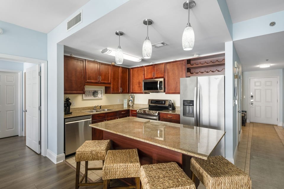 Modern kitchen with granite countertops and stainless steel appliances