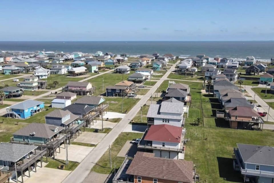 A bird's-eye view of a coastal community where every day is a beach day.