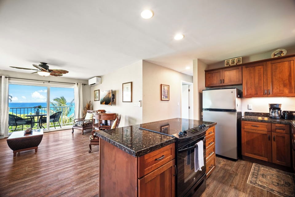 Cook with the ocean in the window and the living room a step away.