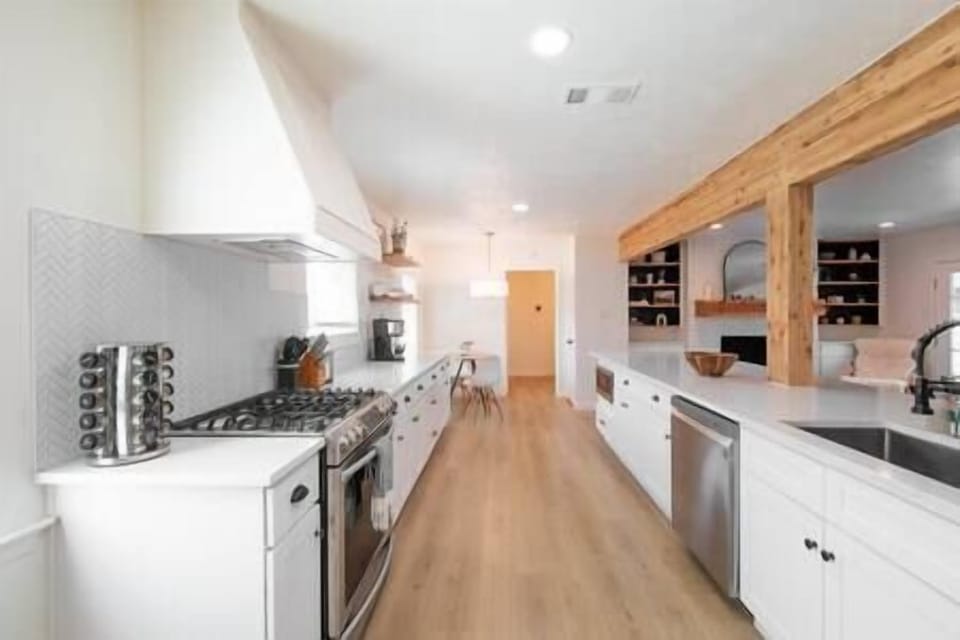 Kitchen w/ premium upgrades is efficiently laid out next to Breakfast & living area