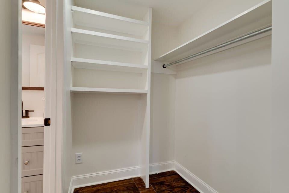 Bedroom 1 includes a spacious closet, providing ample storage for clothing and personal items.