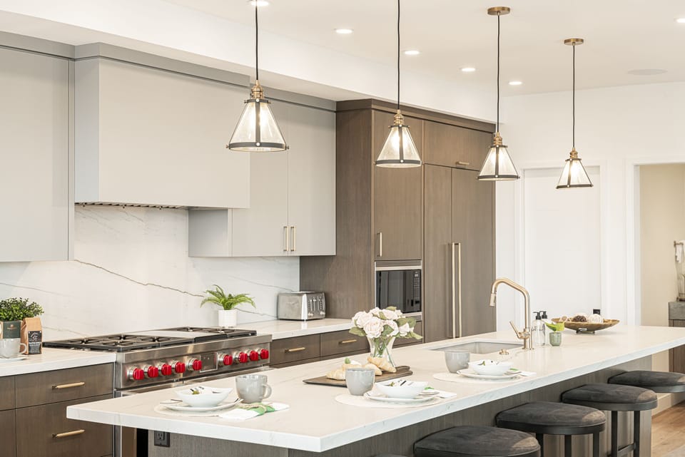 Large center island with seating for six and a Thermador 2-drawer beverage fridge