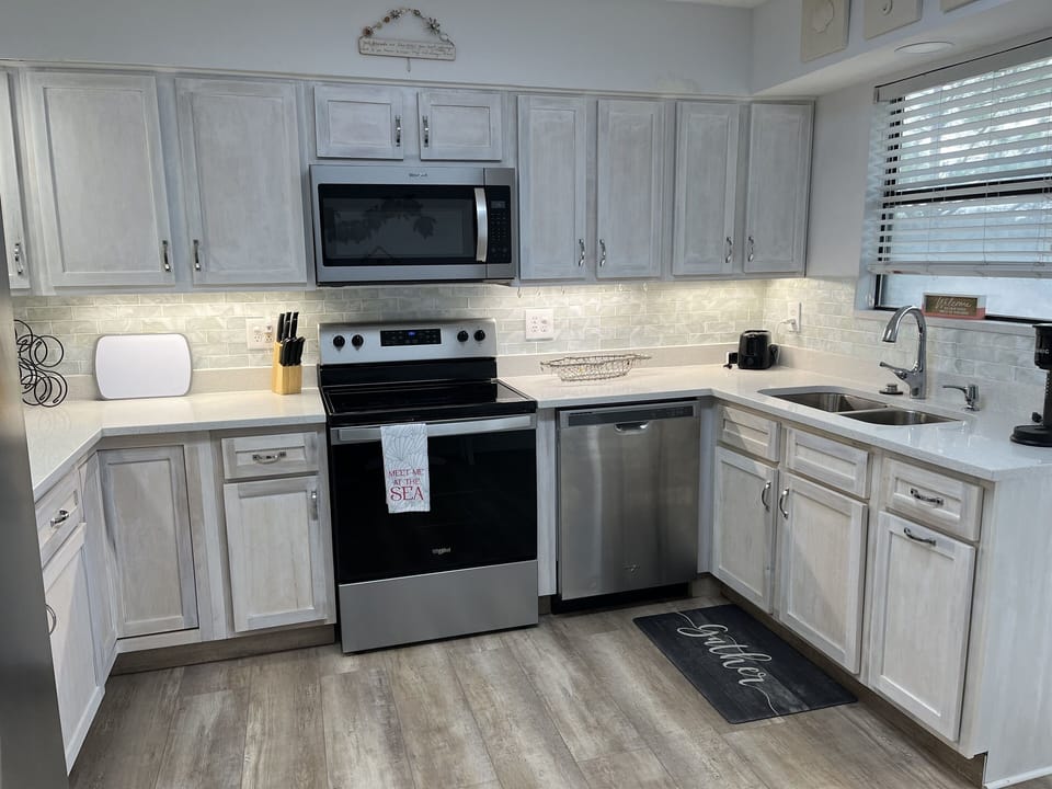 Freshly renovated, fully equipped kitchen with all new dishes & pots & pans.  