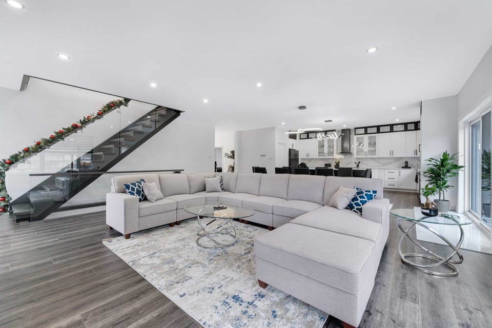 Elegant living room w/ modern decor ideal for relaxation & social gatherings