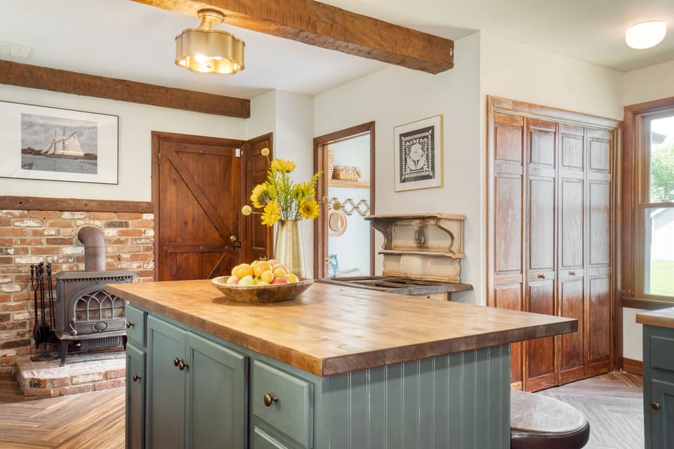 The kitchen features unique antique pieces.