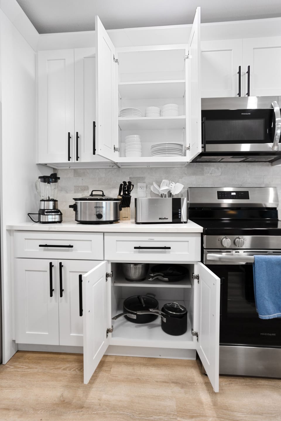 Fully equipped kitchen with blender, toaster, crock pot, pots & pans