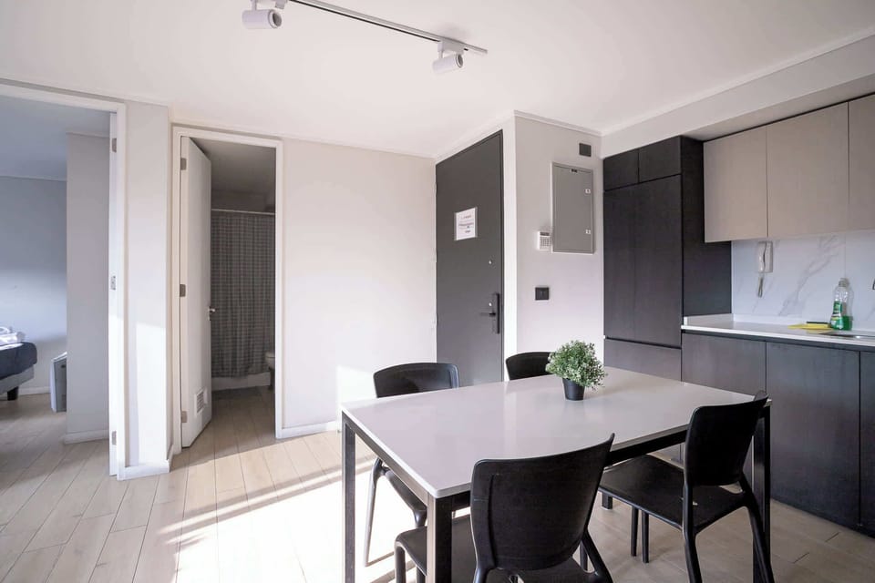 Bright and modern dining space perfect for cozy meals in a stylish apartment setting.