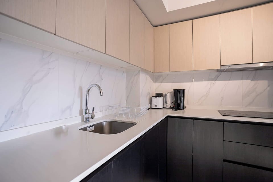Sleek and modern kitchen with all essentials for a comfortable stay in the heart of Chile.