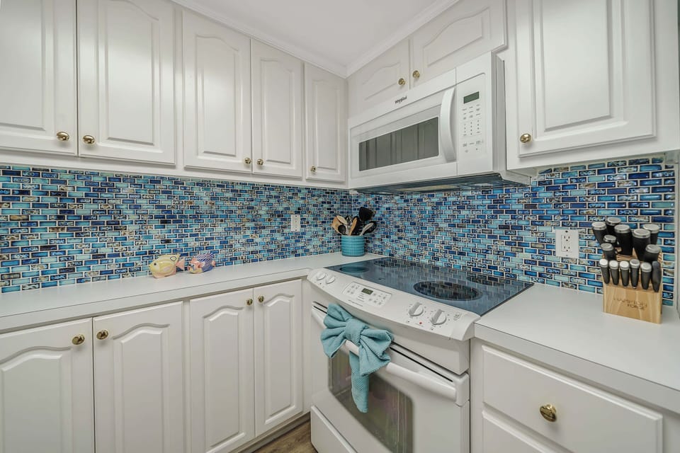 The fully equipped kitchen has everything you need to prepare meals for family & friends.