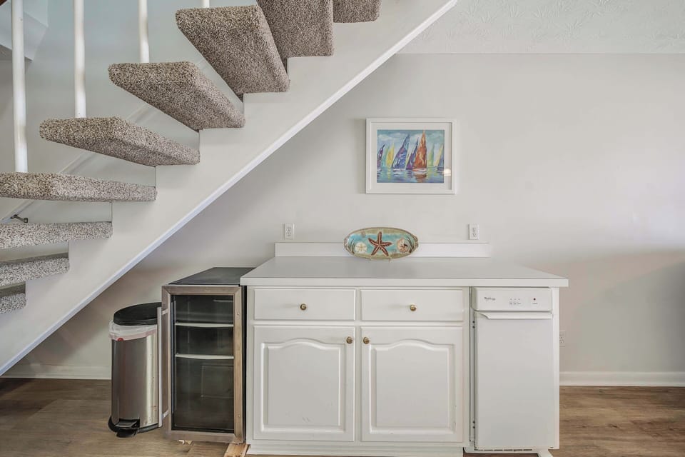 There is a separate wet bar area with beverage cooler and ice maker.