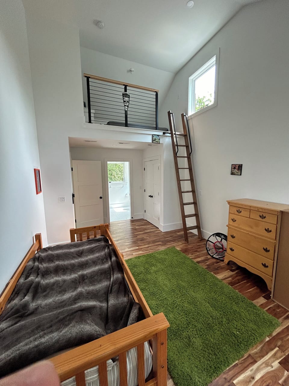 The bunk room also has a loft