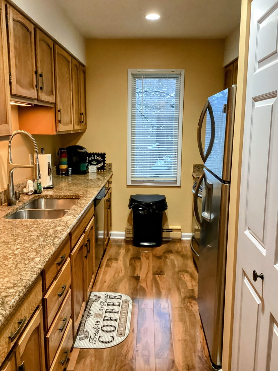 Fully stocked kitchen with stainless steel appliances and ice maker