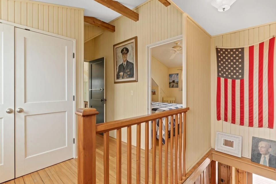 Upstairs hallway. The washer/dryer is located behind these closet doors.