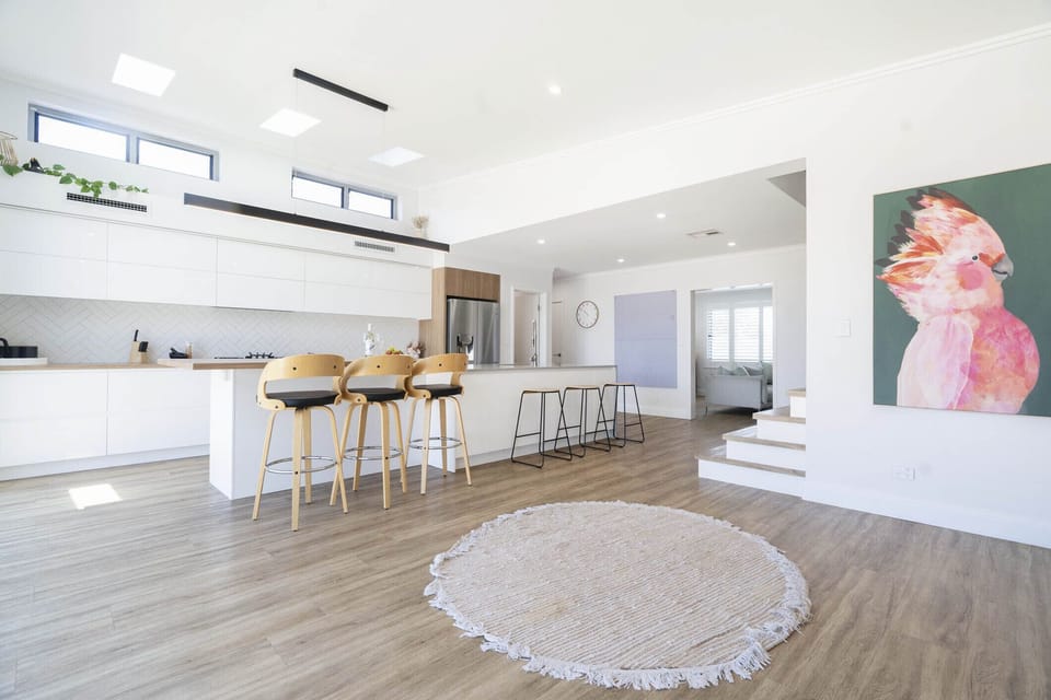 Modern open-plan kitchen and living with natural light