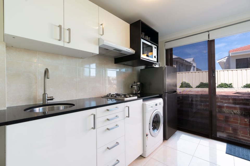 Kitchen with view to courtyard.
