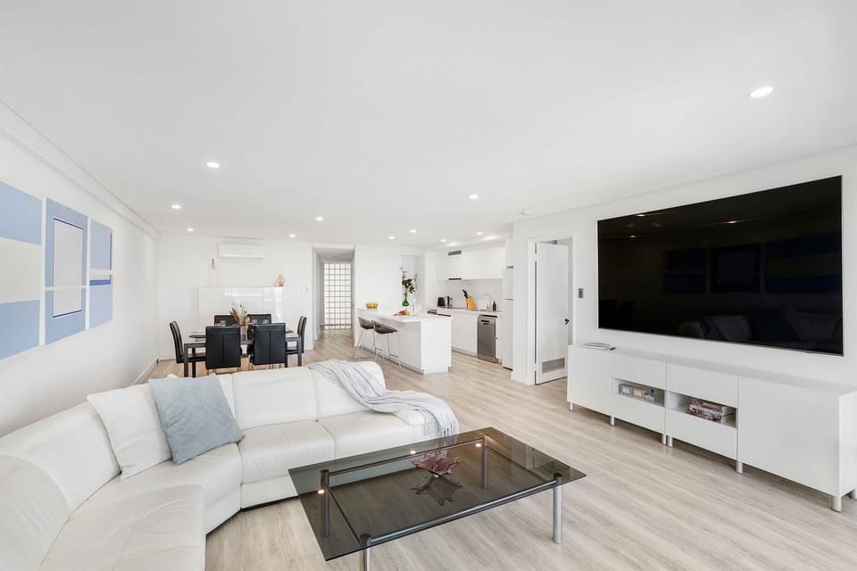Lounge with 98 inch TV great for movie nights