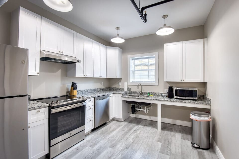 Chic Fully furnished Kitchen with Oven, Stove, Microwave, Refrigerator, Freezer, Keurig Coffee, in Biloxi, MS. A short drive from Gulfport, MS and Ocean Springs, MS