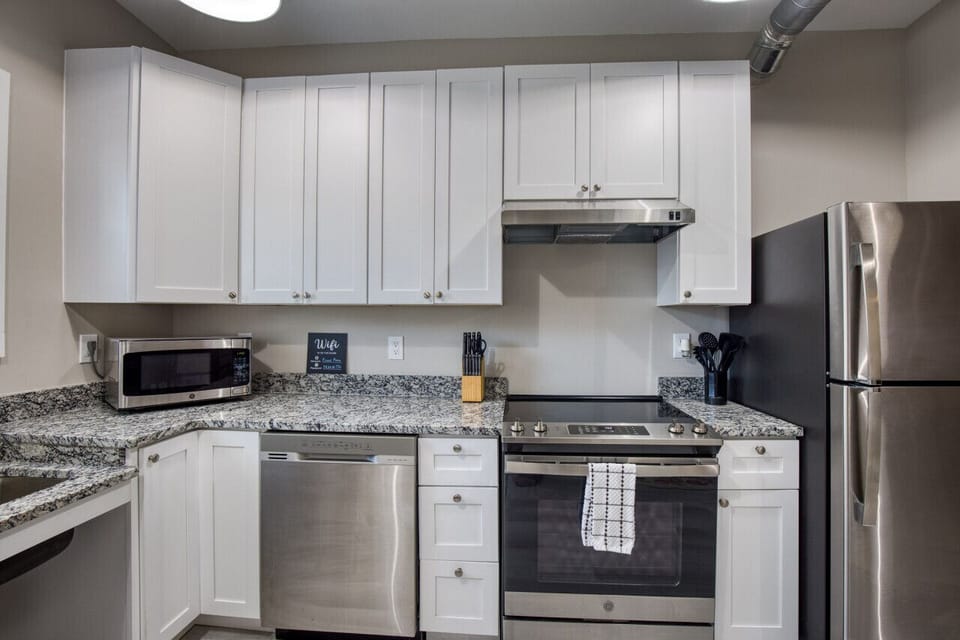 Chic Fully furnished Kitchen with Oven, Stove, Microwave, Refrigerator, Freezer, Keurig Coffee, in Biloxi, MS. A short drive from Gulfport, MS and Ocean Springs, MS